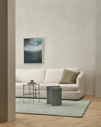 Baya Sandringham Floor Rug in aquamarine under modern sofa in minimalist living room