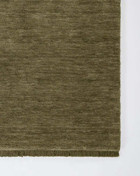Baya Sandringham Floor Rug in basil green with dense hand-knotted NZ wool pile and delicate fringing