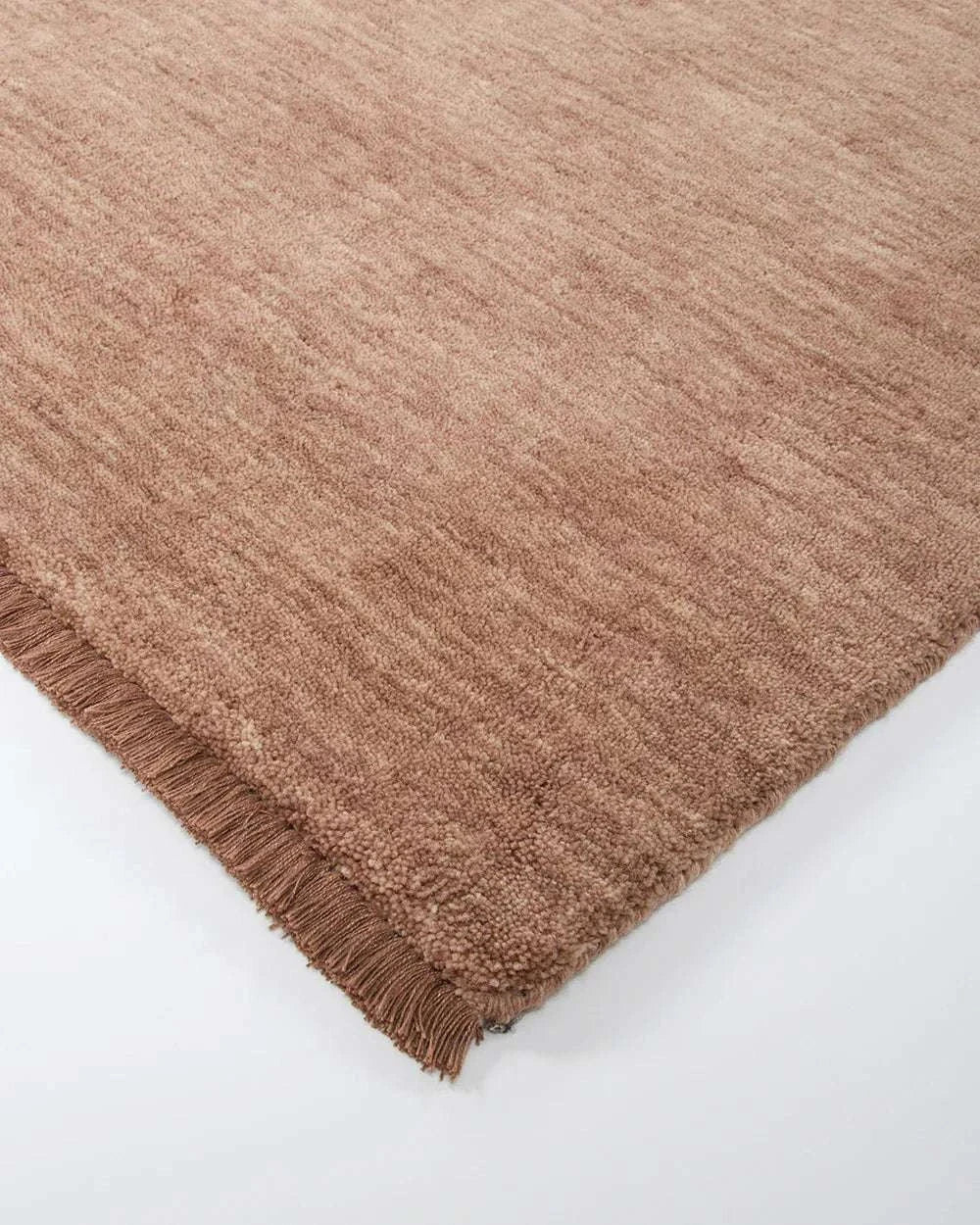 Baya Sandringham Floor Rug in Rosewood with hand-knotted wool pile and delicate fringed edges