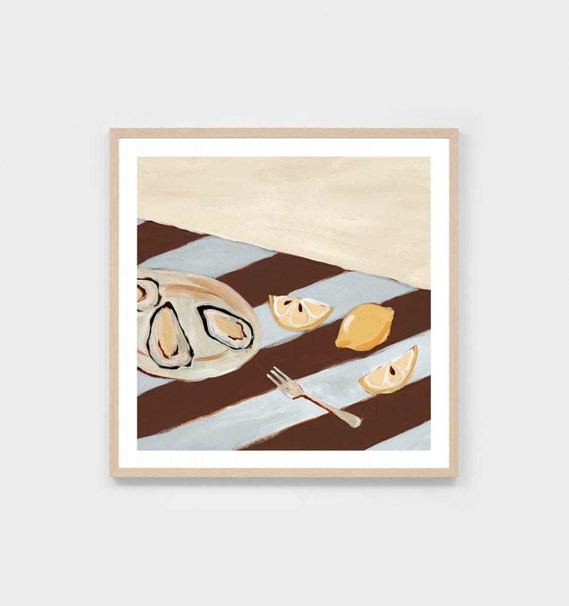 Middle of Nowhere seaside dining still life print with blue and brown stripes and lemon wedges in oak frame