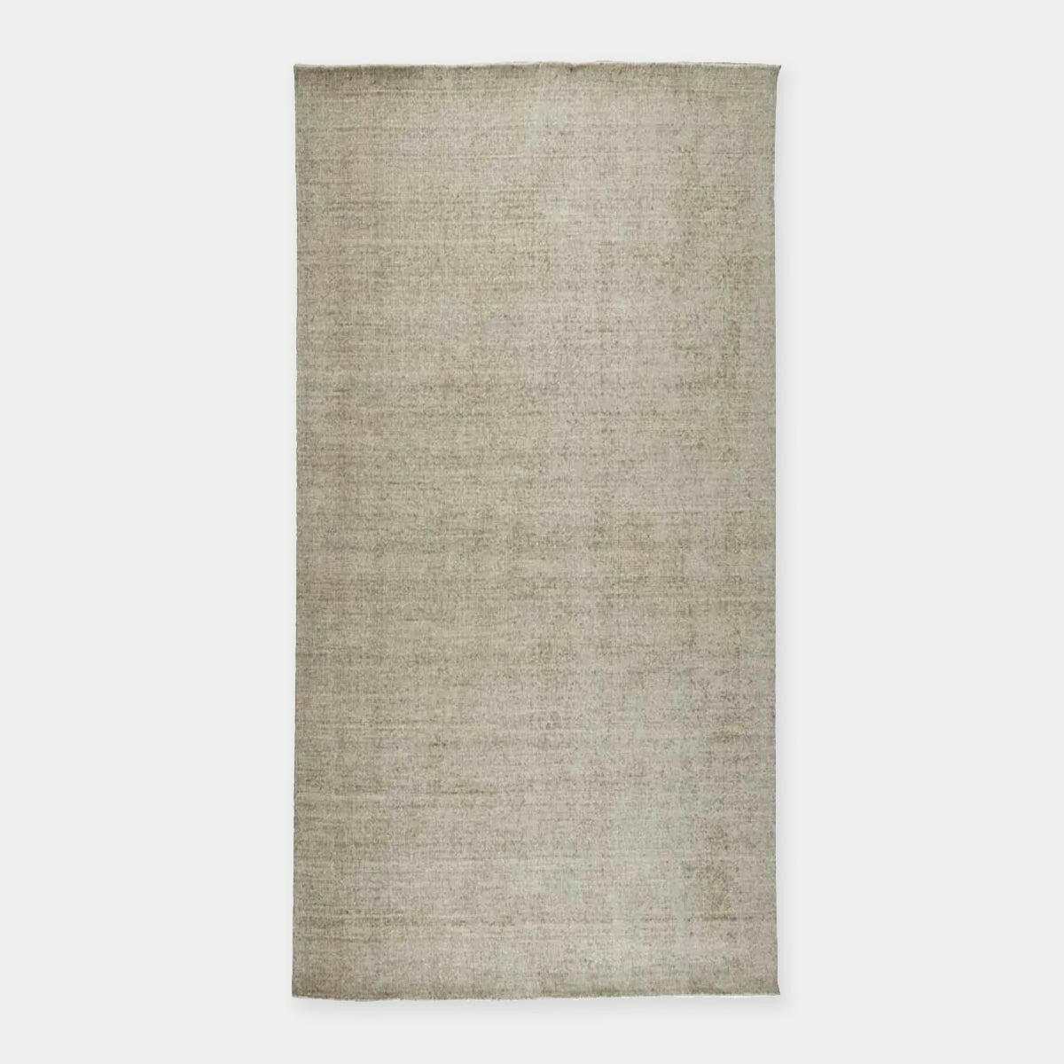 GlobeWest Tepih Neptune hand-woven silver grey wool blend indoor rug with subtle rustic texture