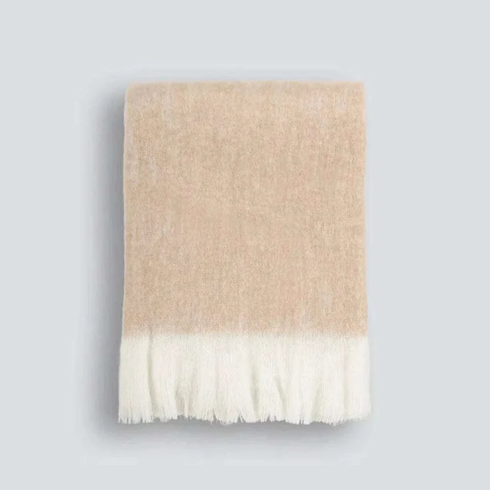 Baya Sorrento Throw in clay with soft brushed wool and off-white feathered fringe