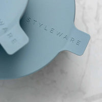 Sky blue Styleware nesting bowl with embossed logo, lightweight and snap-tight design