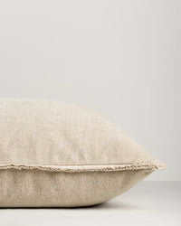 Baya Sutton Cushion in oat color with cotton-linen chenille and fringe border