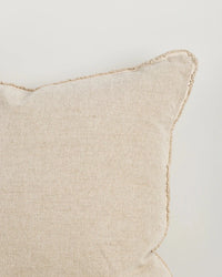 Baya Sutton Cushion in oat color with cotton-linen chenille texture and fringe detailing