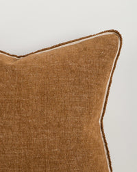 Baya Sutton Cushion in praline with matte cotton-linen chenille, velvety texture, woven border, and fringe