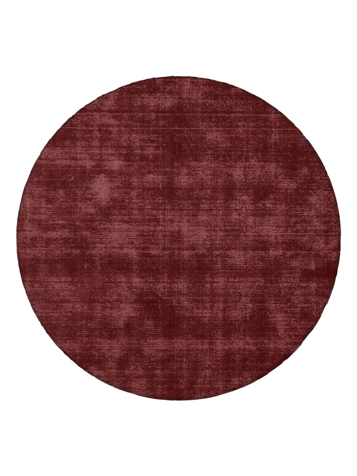 Round Tait Rug in dark cherry color, hand-loomed wool and cotton blend with tip-sheared finish