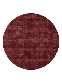Round Tait Rug in dark cherry color, hand-loomed wool and cotton blend with tip-sheared finish