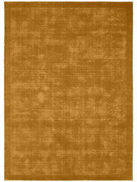 Tait Rug in turmeric color with hand-loomed New Zealand wool and textured finish