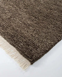 Baya Tanami Floor Rug in earthy brown with hand-knotted New Zealand wool texture and soft cotton fringe