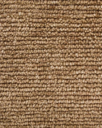 Close-up of Baya Tanami Floor Rug in warm treacle tone with hand-knotted ribbed texture made from 100% New Zealand wool