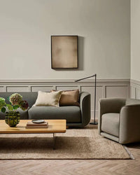 Baya Tanami Floor Rug in treacle tone with hand-knotted NZ wool texture in modern living room setting