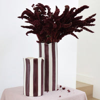 norsu Studio Flow handpainted ceramic vase with scalloped petal rim and burgundy blue stripe glaze