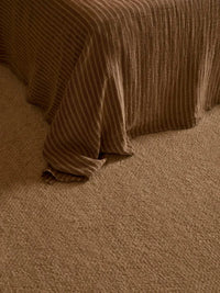 Hand-loomed Vogel Rug in honey with soft wool pile and refined linear border