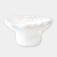 norsu Studio Flow white sculptural ceramic pedestal fruit bowl with ruffled edge and blush glaze
