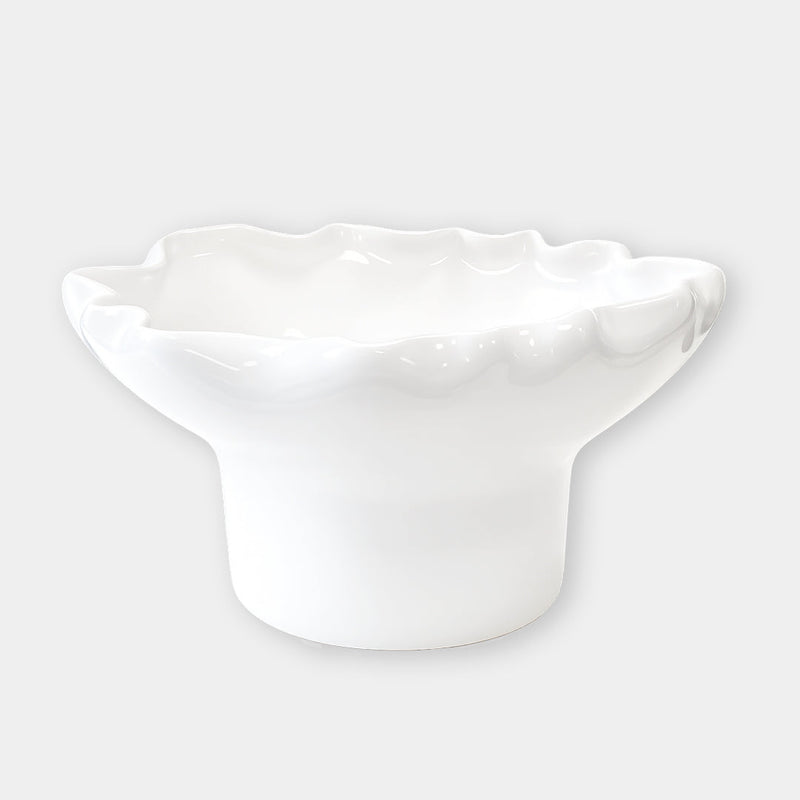 norsu Studio Flow white sculptural ceramic pedestal fruit bowl with ruffled edge and blush glaze