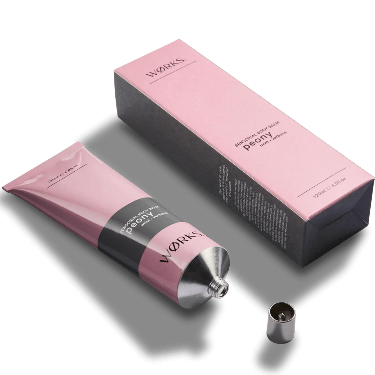 Works Body Balm Tube Peony 120ml in pink recyclable aluminium packaging with black and pink box for deep hydration and non-greasy finish