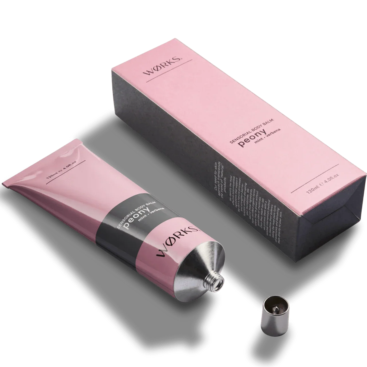 Works Body Balm Tube Peony 120ml in pink recyclable aluminium packaging with black and pink box for deep hydration and non-greasy finish