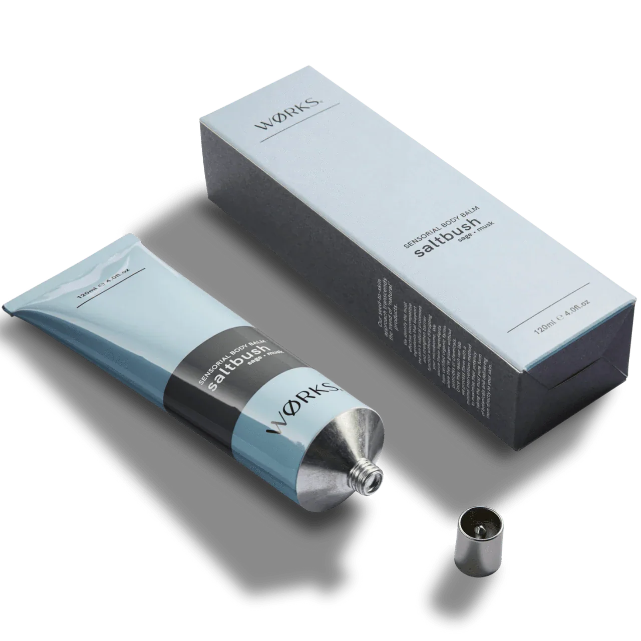 Works Body Balm Saltbush in a sleek recyclable aluminium tube with packaging, hydrating and non-greasy formula.