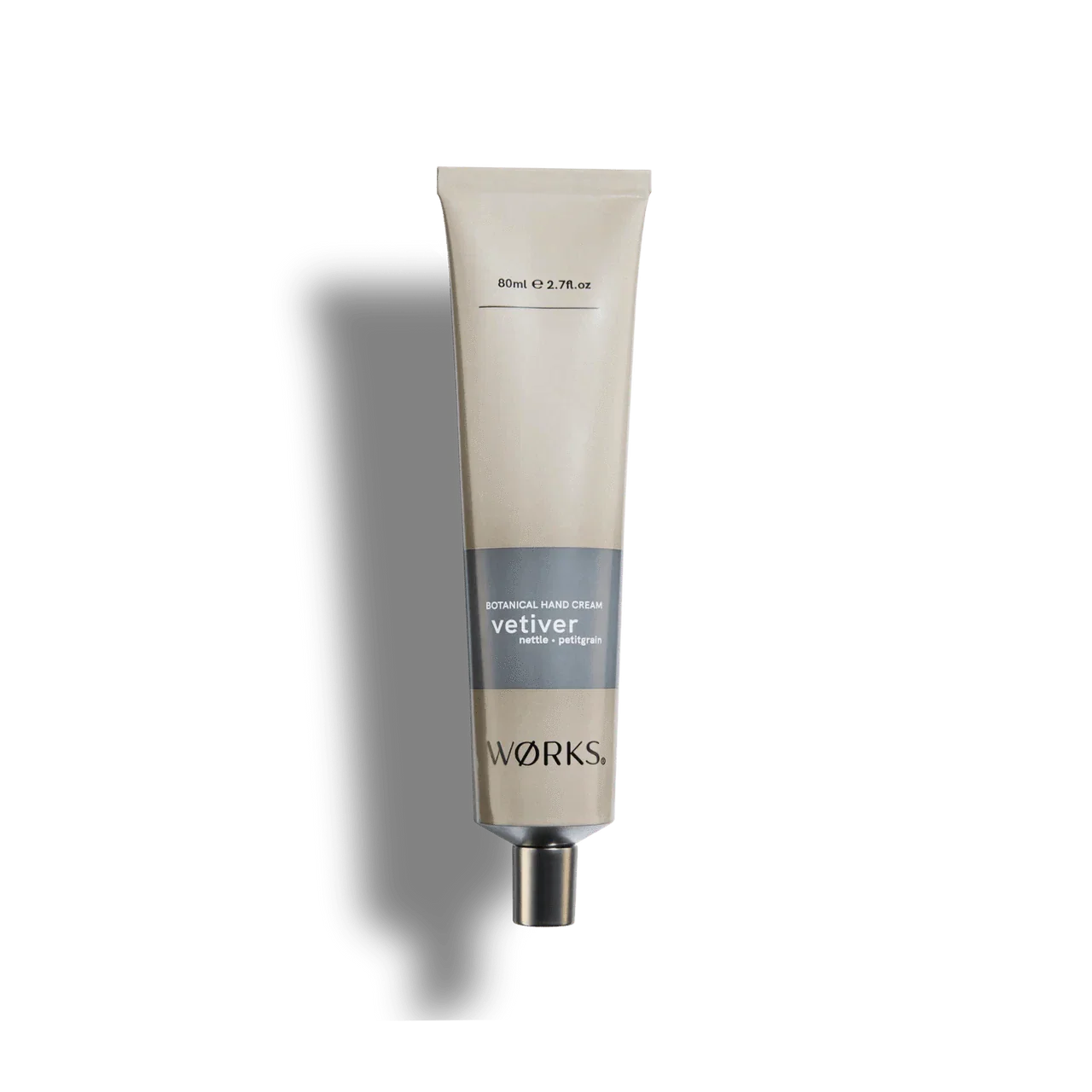 Works Hand Cream tube in beige with aluminium cap, vetiver scent, 80ml plastic-free packaging