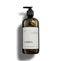 Works Hand Soap Vetiver 500ml in refillable smoky grey glass bottle with earthy botanical ingredients and gentle cleansing formula