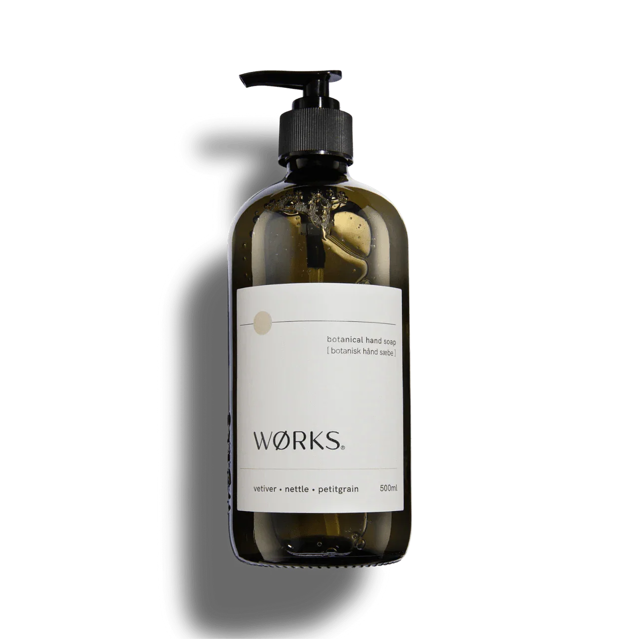 Works Hand Soap Vetiver 500ml in refillable smoky grey glass bottle with earthy botanical ingredients and gentle cleansing formula