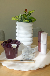 norsu Studio Flow burgundy sculptural ceramic scented candle with Antibes fragrance and ruffled edge vessel