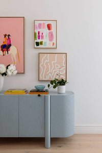 Virtual styling service showing art packages with room photo upload and personalized design recommendations