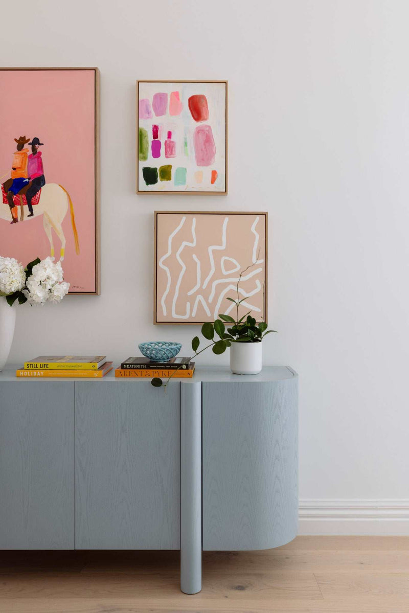 Virtual styling service showing art packages with room photo upload and personalized design recommendations