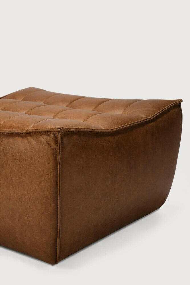 Ethnicraft Sofa N701 footstool in old saddle aniline leather with tufted top and soft cushioning