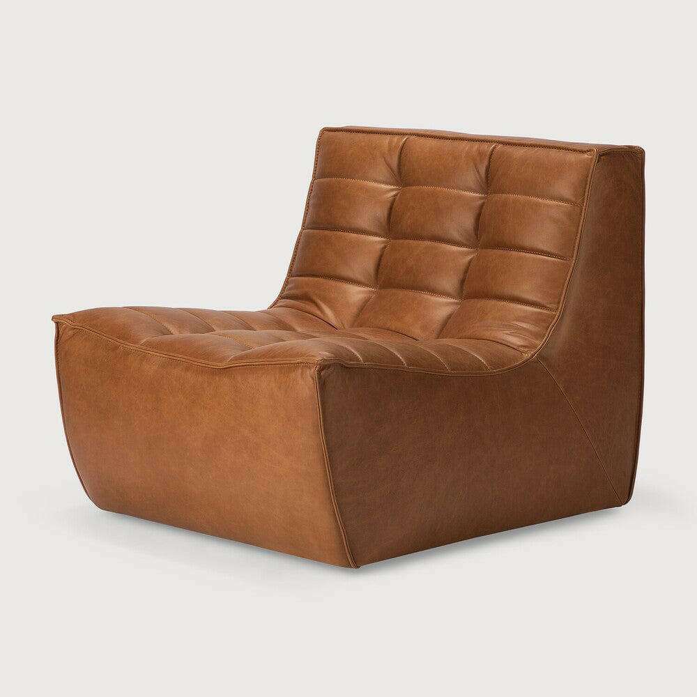 Ethnicraft Sofa N701 1 Seater in old saddle brown aniline leather with tufted seat and backrest design.
