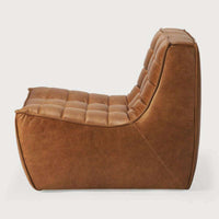 Ethnicraft Sofa N701 one-seater in old saddle brown aniline leather with tufted cushioning and nylon glide legs.