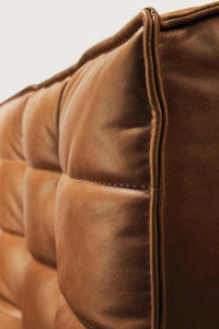 Close-up of Ethnicraft Sofa N701 2 Seater in Old Saddle full aniline leather upholstery showing detailed stitching and padded cushions