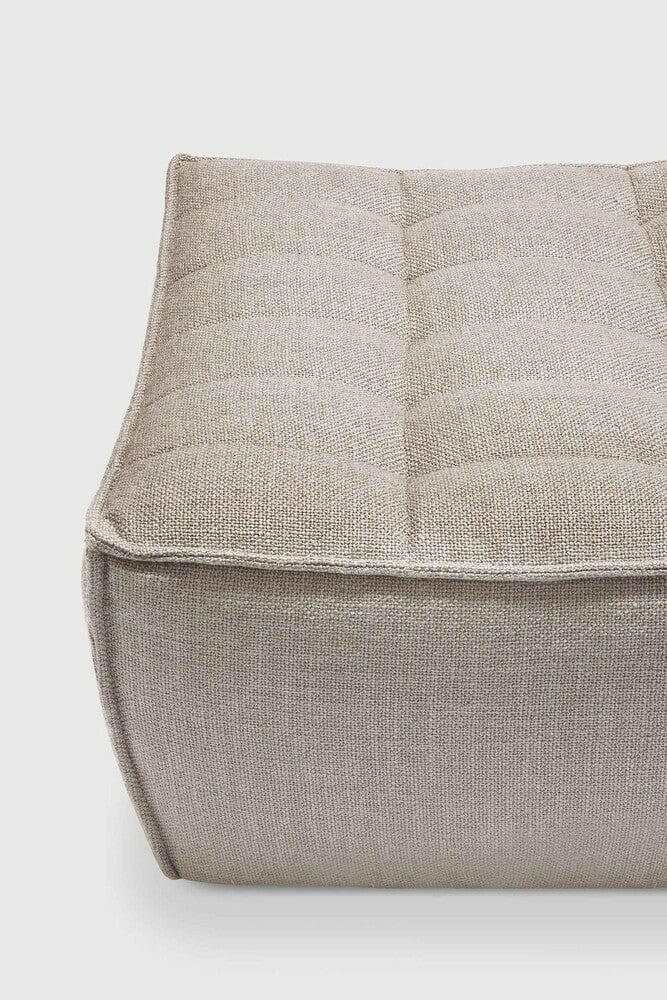 Dark beige Ethnicraft Sofa N701 footstool with textured fabric and cushioned top