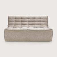 Ethnicraft Sofa N701 2-seater in dark beige with tufted upholstery and modern low-profile design.