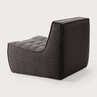 Dark grey Ethnicraft Sofa N701 single seater with tufted cushion and modern design