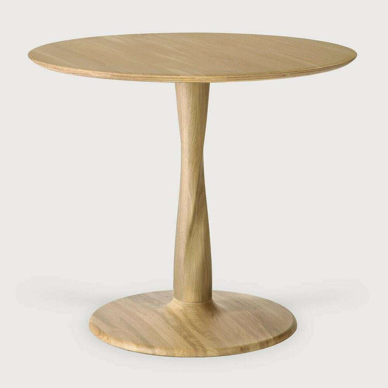 Ethnicraft Oak Torsion round dining table with twisted base in varnished solid oak wood