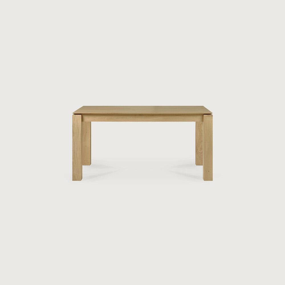 Ethnicraft Slice dining table in natural solid oak with simple design and subtle corner details