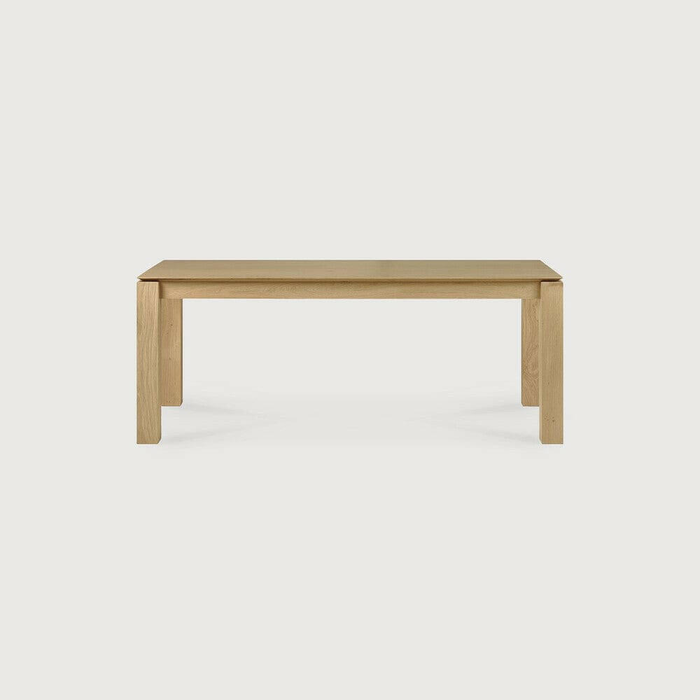 Ethnicraft Slice dining table in natural oak with solid wood construction and simple, elegant design