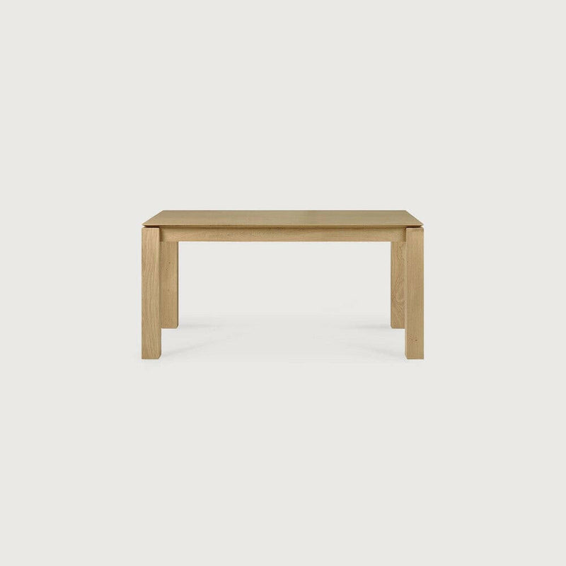 Ethnicraft Slice extendable dining table in natural oak with clean design and solid wood construction