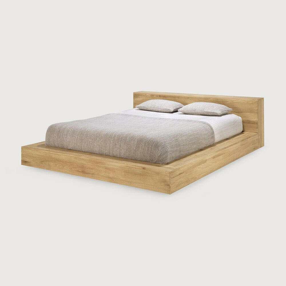 Ethnicraft Madra Bed in natural oak with solid European oak frame and minimalist design.
