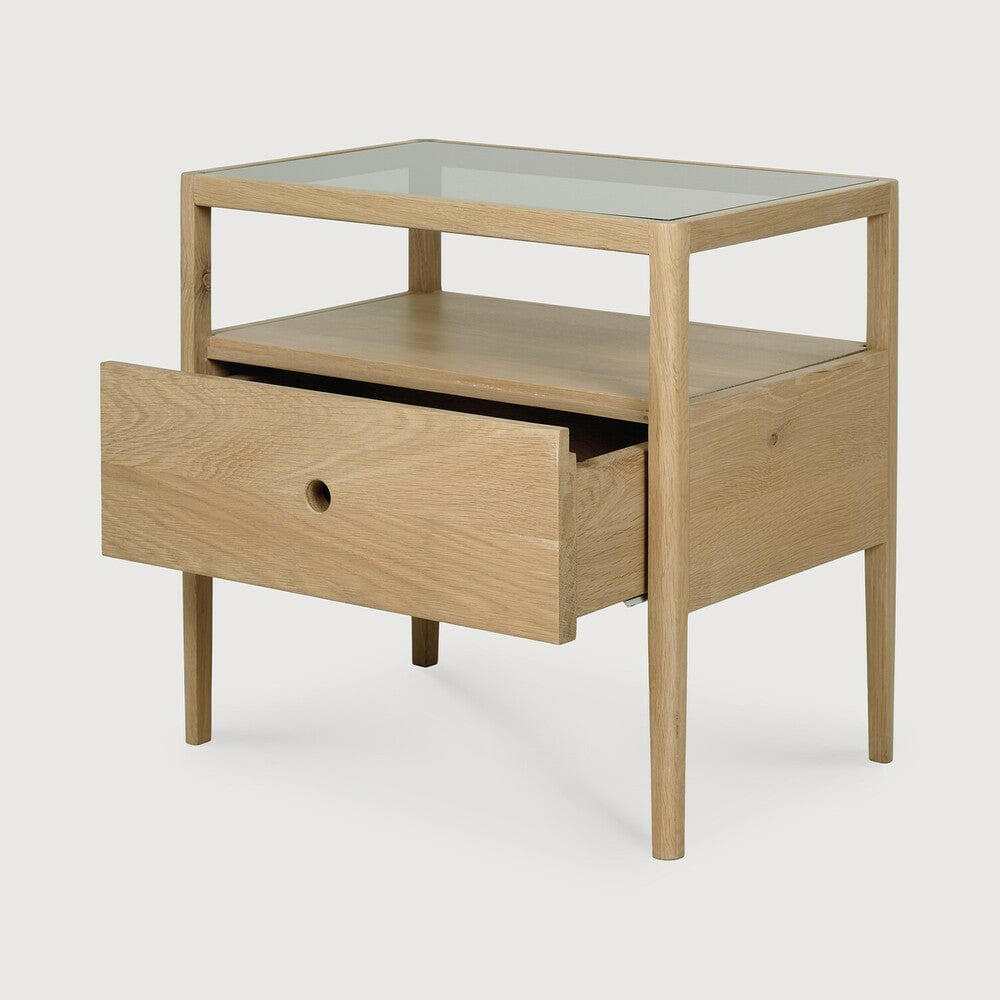Ethnicraft Spindle Bedside Table in natural oak with single drawer and smokey glass top, solid European oak construction.
