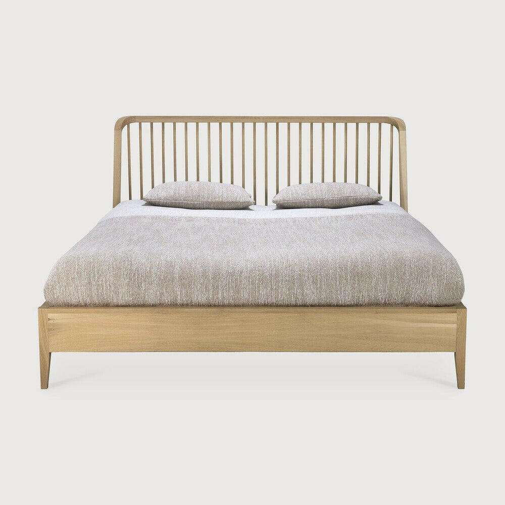 Ethnicraft Spindle Bed made of natural oak with spindle headboard and tapered legs