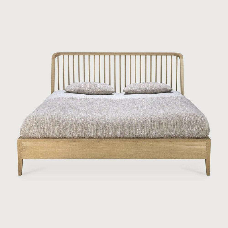 Ethnicraft Spindle Bed made of natural oak with spindle headboard and tapered legs