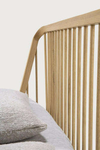 Close-up of Ethnicraft Spindle Bed headboard made of natural oak with vertical spindle design
