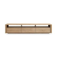 Ethnicraft Shadow TV Stand in natural oak with clean lines, three drawers, and open shelf for media storage.