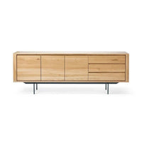 Ethnicraft Oak Shadow Sideboard in natural oak with three doors and drawers, solid European oak on black metal legs