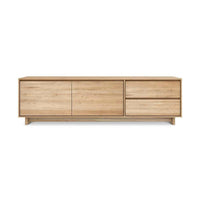 Ethnicraft Wave natural oak entertainment unit with two open drawers and one flip-down drawer made from solid European oak