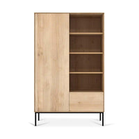 Ethnicraft Whitebird storage unit in natural oak with 2 doors, 2 drawers, and open shelving on black metal legs