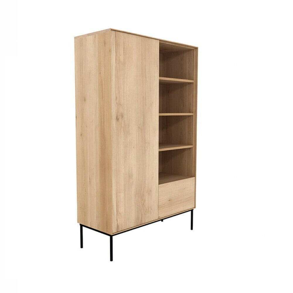 Ethnicraft Whitebird Storage Unit in natural oak with 2 doors, 2 drawers, open shelves, and black metal legs.
